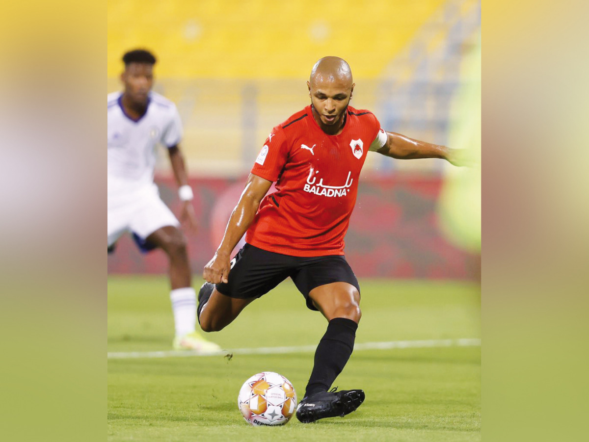 Al Rayyan's Yacine Ibrahim shoots to score their second goal.