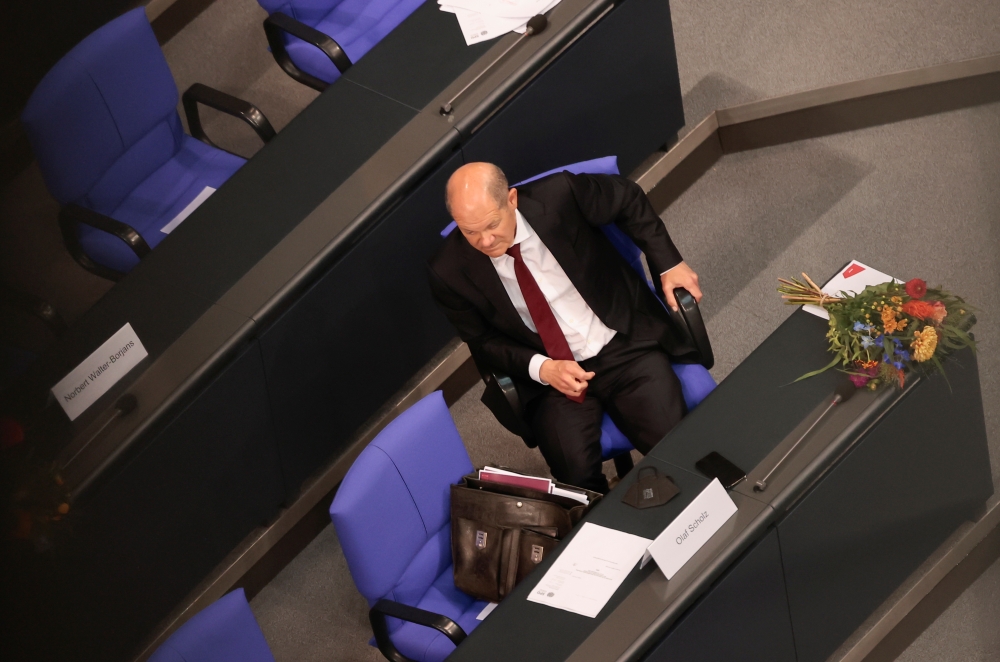 Social Democratic Party top candidate for chancellor Olaf Scholz attends a SPD faction meeting at Bundestag in Berlin, Germany, September 28, 2021. REUTERS/Hannibal Hanschke