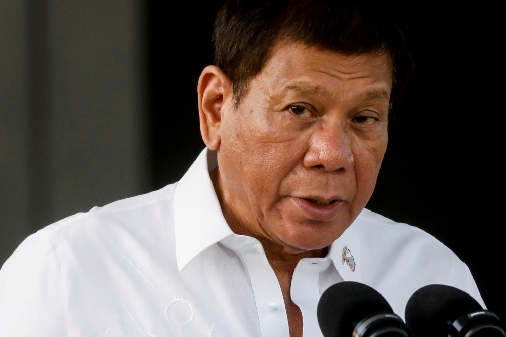 Philippine President Rodrigo Duterte speaks at Villamor Air Base in Pasay, Metro Manila, Philippines, February 28, 2021. REUTERS/Eloisa Lopez/File Photo