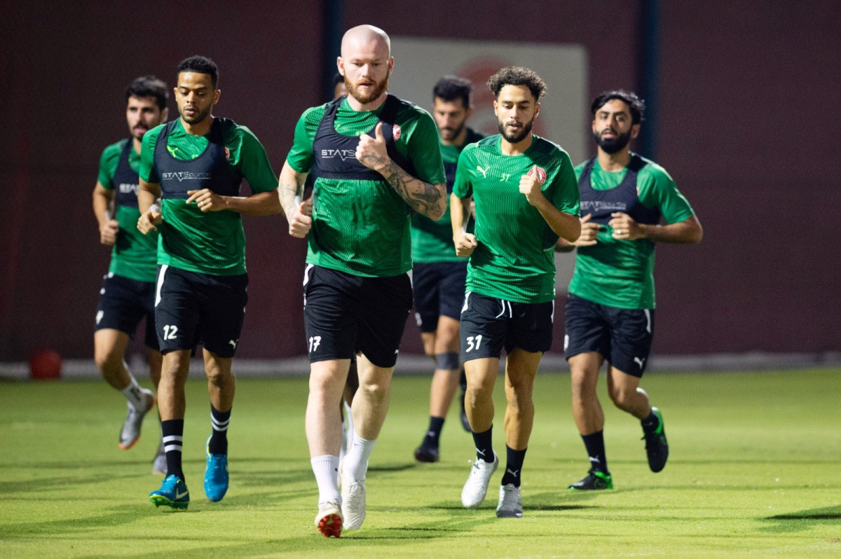 Al Arabi players during a training session ahead of the match.