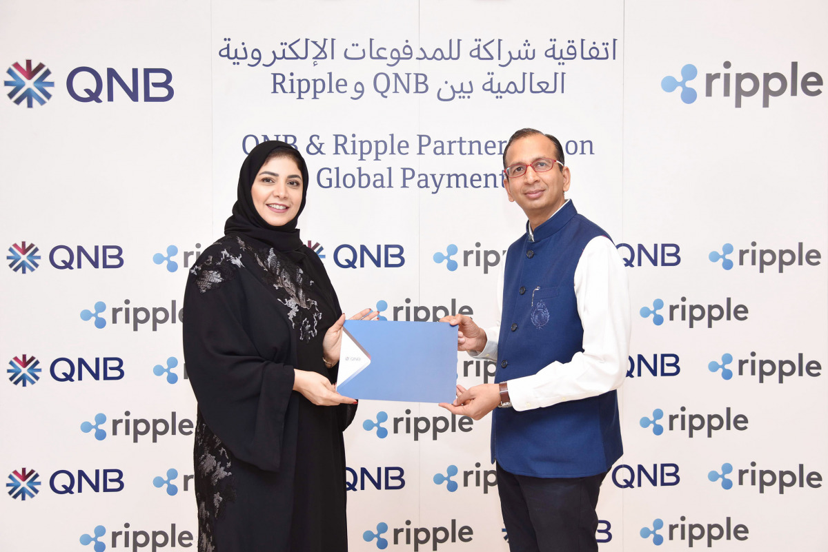 QNB and Ripple officials pose during the launch of remittance service.