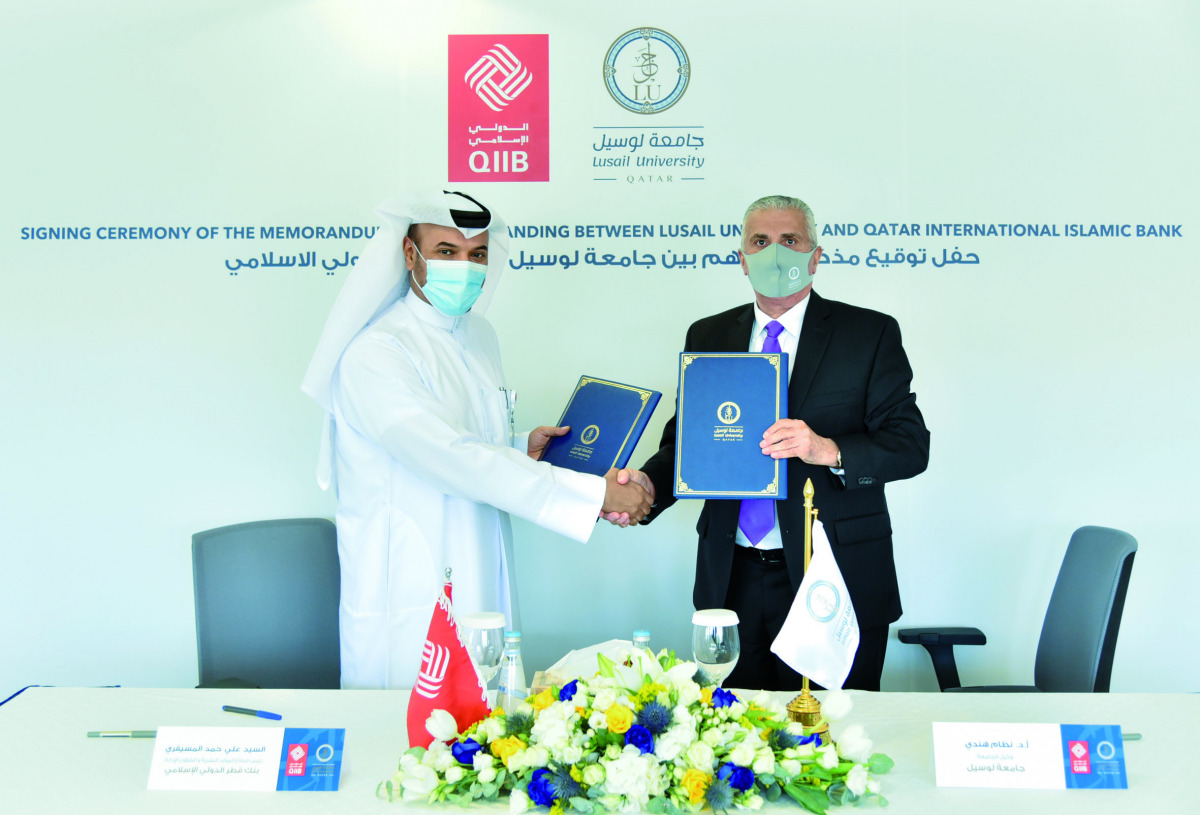 QIIB and Lusail University officials during the MoU signing ceremony.