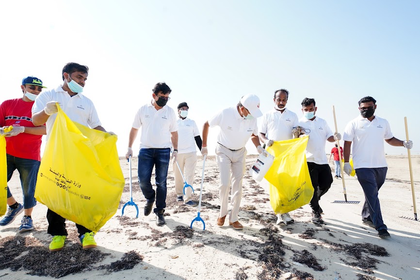 Ambassador of India to Qatar Dr. Deepak Mittal with ICC members during beach cleaning.