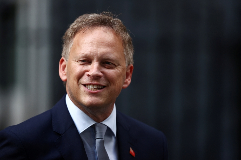 File photo: Britain's Transport Secretary Grant Shapps walks outside Downing Street in London, Britain, September 15, 2021. Reuters/Hannah McKay/File Photo