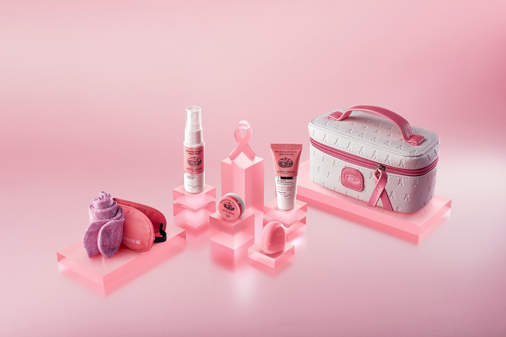 The airline is offering its passengers custom-designed, pink-themed amenity kits and special menus.