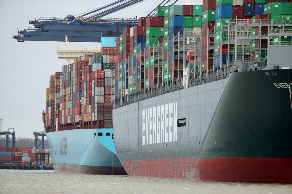 A view of the Port of Felixstowe, as containers are seen aboard the container ship Ever Greet, in Felixstowe, Britain, January 28, 2021. Reuters/Peter Cziborra//File Photo