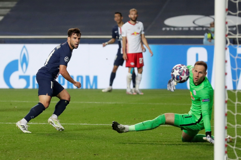 August 18, 2020 Paris St Germain's Juan Bernat scores their third goal, as play resumes behind closed doors following the outbreak of the coronavirus disease (COVID-19) Manu Fernandez/Pool via REUTERS/File Photo