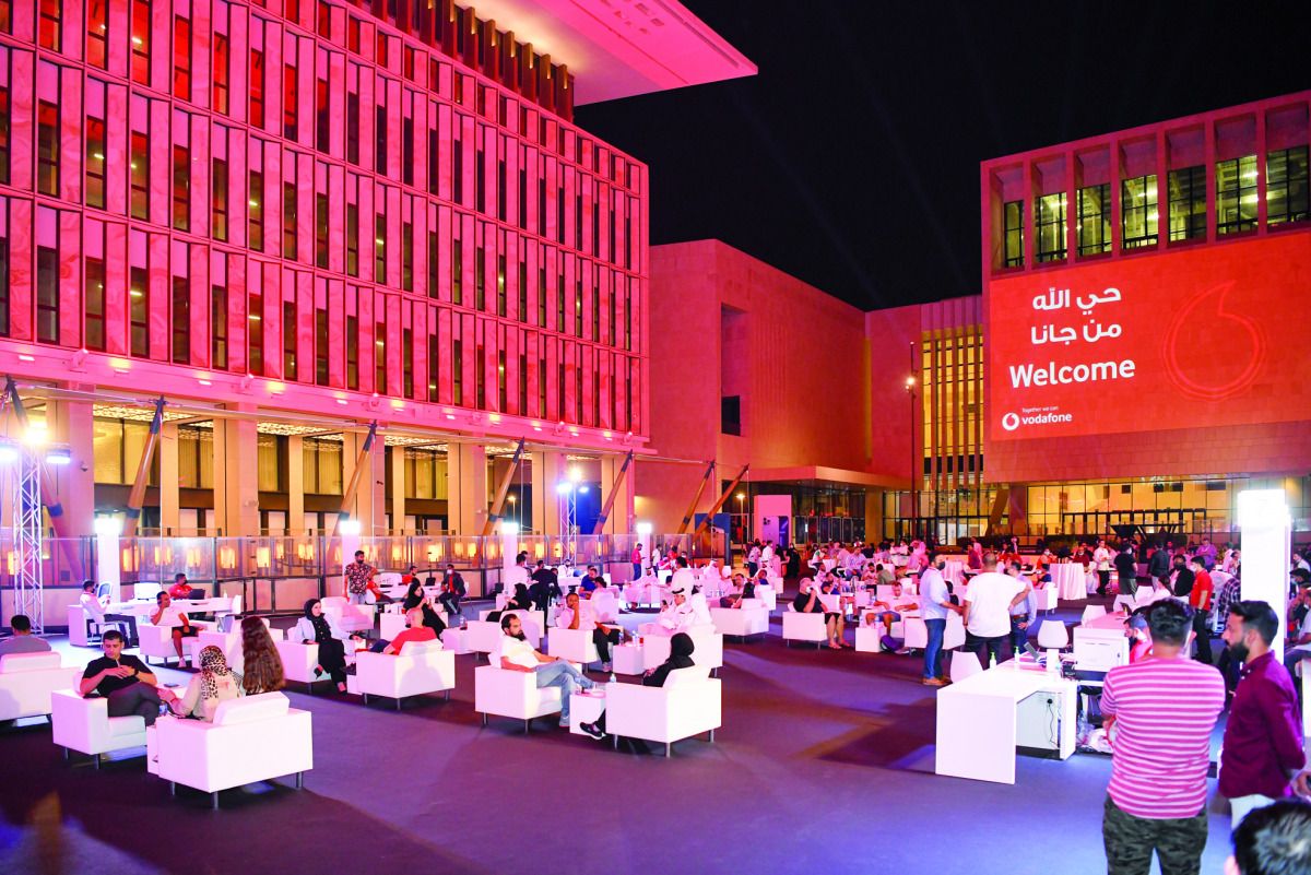 Participants during Vodafone Qatar’s official launch of the new iPhone 13 series at Barahat Square, Msheireb Downtown Doha, yesterday. 