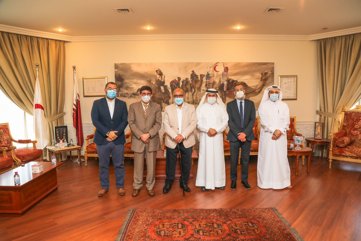 Secretary-General of QRCS, Ali bin Hassan Al Hammadi, with members of Humanitarian Forum delegation during the meeting.