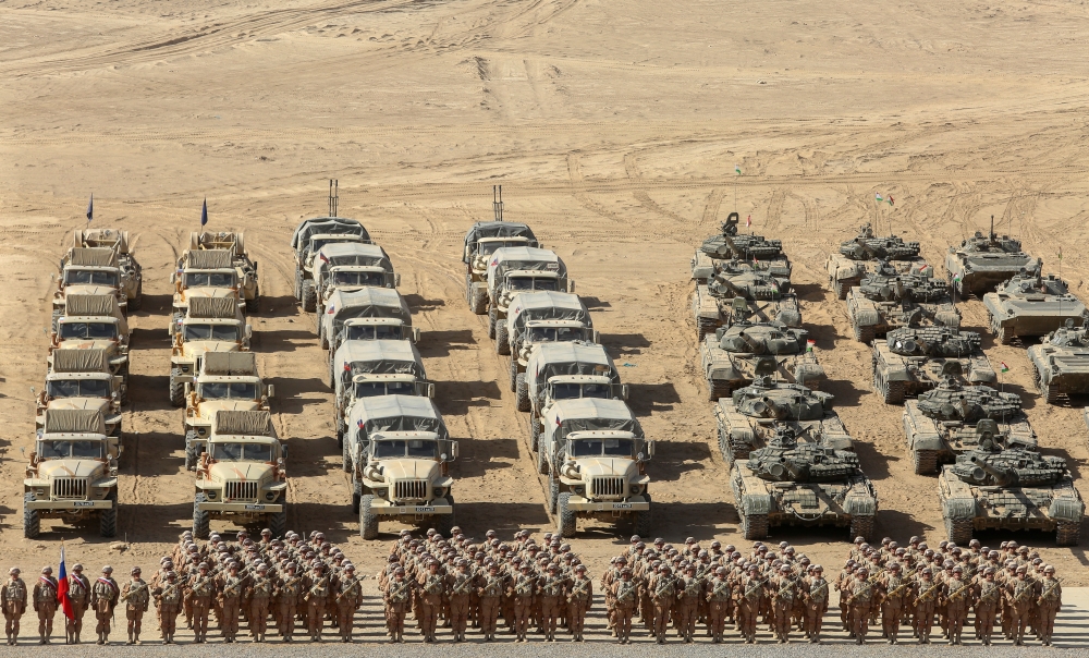Russian service members line up during military drills carried out by the Russia-led Collective Security Treaty Organisation (CSTO) at the Harb-Maidon training ground, located near the Tajik-Afghan border in the Khatlon region, Tajikistan October 23, 2021