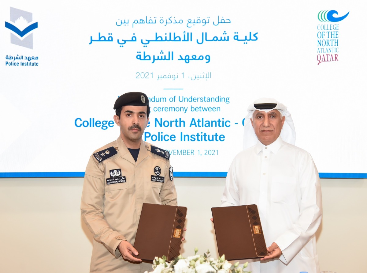 CNA-Q’s President Dr. Salem Al Naemi and Director of the Police Institute, Colonel Ali Saud Al Hanzab, after signing the MoU.