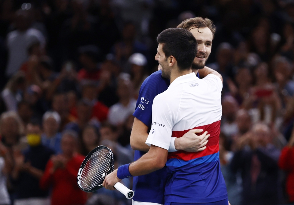  Russia's Daniil Medvedev congratulates Serbia's Novak Djokovic on winning the final match Reuters/Christian Hartmann