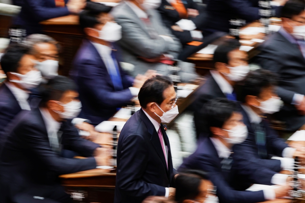 Japan's Prime Minister Fumio Kishida attends a parliamentary session at the Lower House of Parliament in Tokyo, Japan November 10, 2021. Reuters/Issei Kato