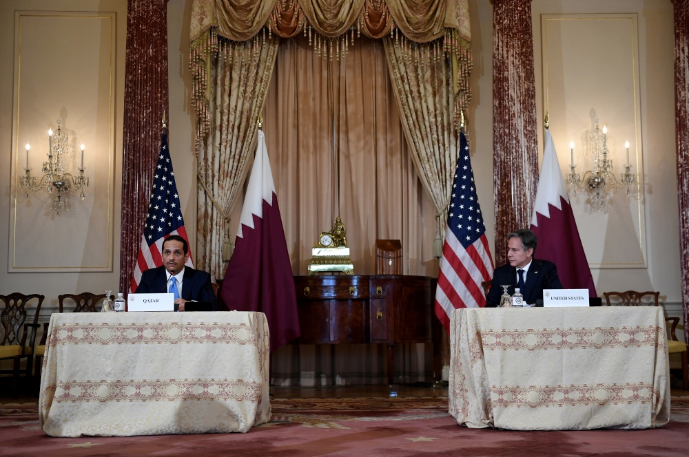 US Secretary of State Antony Blinken (R) and Qatar's Foreign Minister Sheikh Mohammed bin Abdulrahman Al Thani (L) hold a news conference following a US-Qatar Strategic Dialogue signing ceremony at the State Department in Washington, DC on November 12 , 2021. Olivier Douliery/Pool via REUTERS?