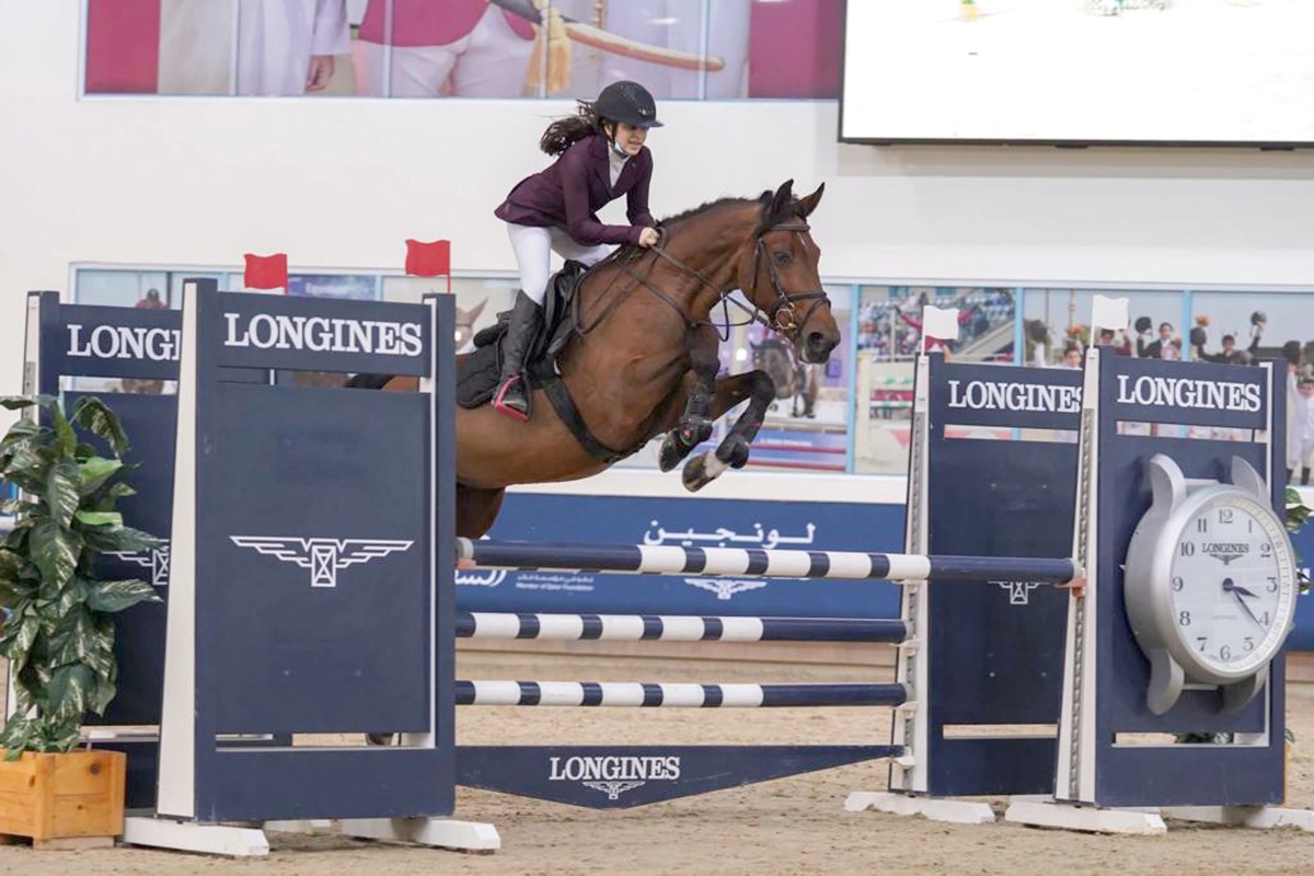 Haya Khalid Al Hitmi competes astride Dusty during the Small Tour event yesterday.