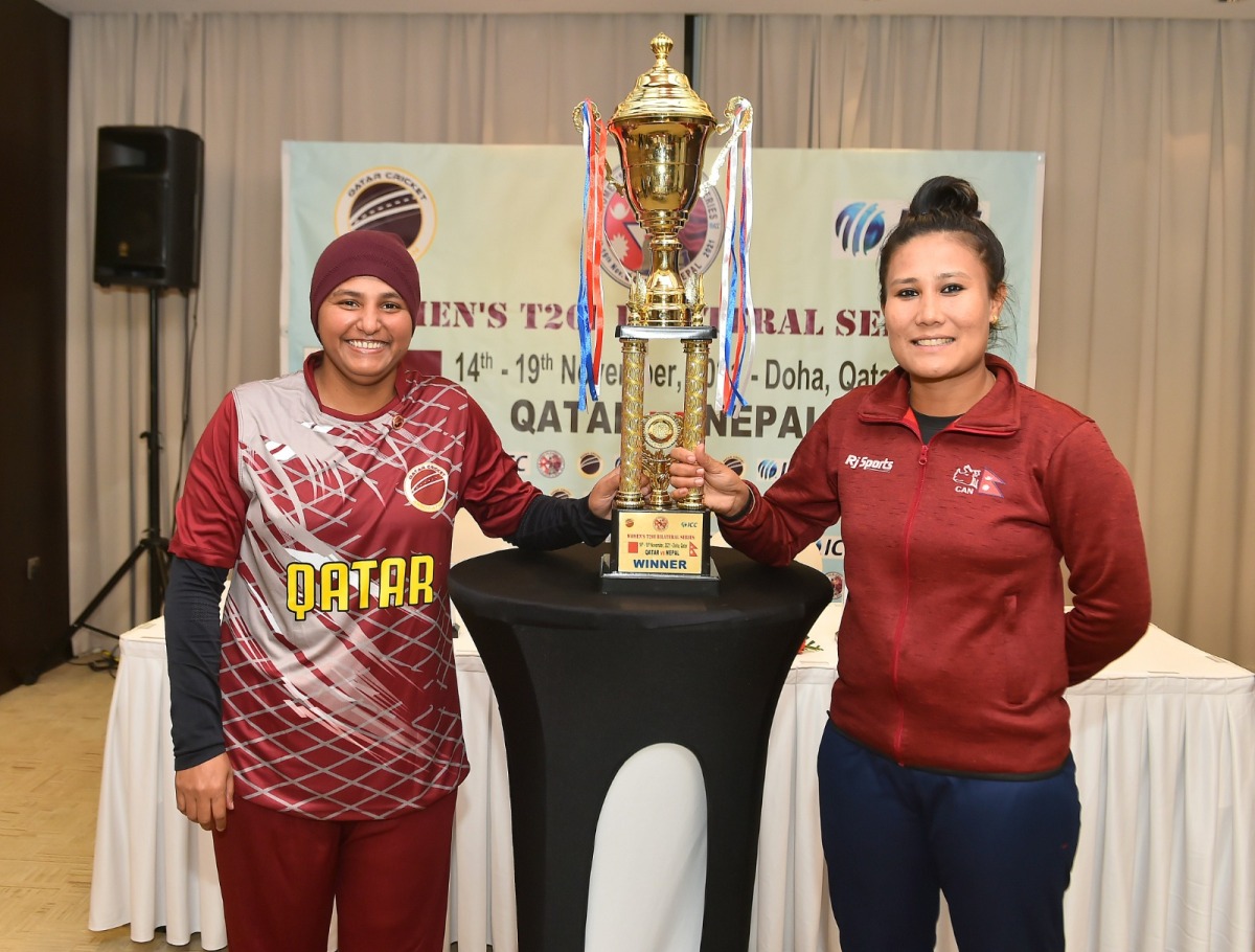 Qatar and Nepal captains pose with the trophy after the unveiling ceremony on Monday. Pics: Abdul Basit 