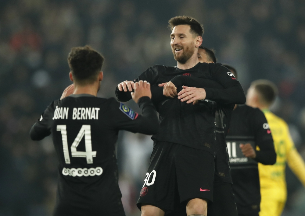 Paris St Germain's Juan Bernat and Lionel Messi celebrate scoring their second goal REUTERS/Benoit Tessier