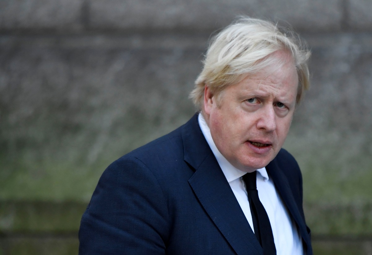 British Prime Minister Boris Johnson at Westminster Cathedral in London, Britain, November 23, 2021. REUTERS/Toby Melville
