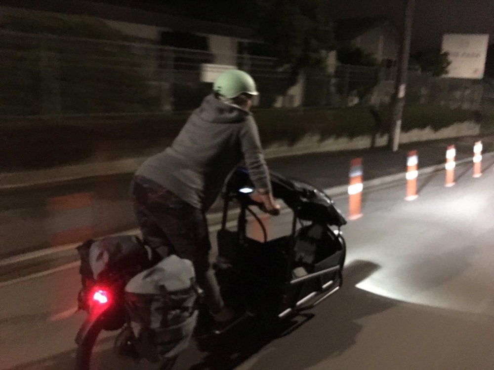 Green Party MP Julie Anne Genter rides a bicyle to the hospital while in labour, in Wellington, New Zealand, November 28, 2021, in this picture obtained from social media. Mandatory credit JULIE ANNE GENTER / FACEBOOK /via REUTERS
