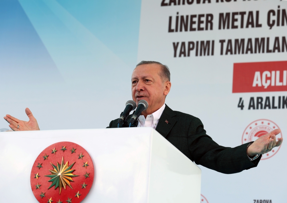 Turkish President Tayyip Erdogan addresses his supporters during a ceremony in the eastern city of Siirt, Turkey, December 4, 2021. Murat Cetinmuhurdar/Presidential Press Office/Handout via Reuters