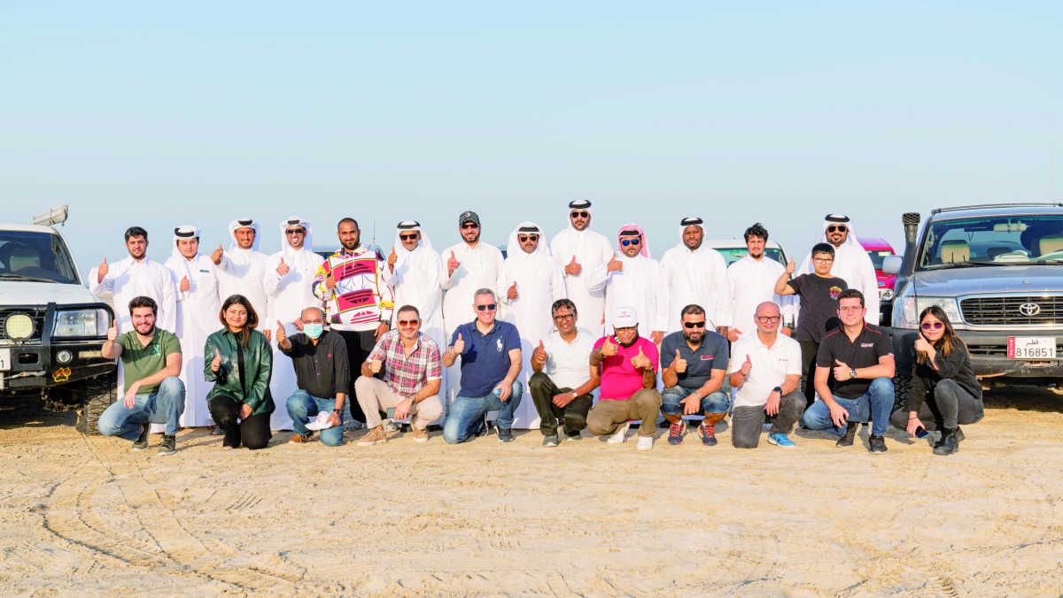 Officials and staff from AAB with members of Aoun Qatar in Mesaieed, recently.  