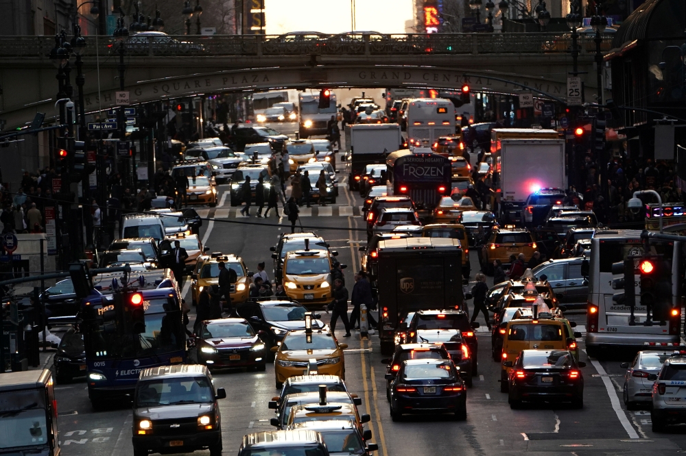 Traffic is pictured at twilight along 42nd St. in the Manhattan borough of New York, U.S., March 27, 2019. REUTERS/Carlo Allegri/File Photo