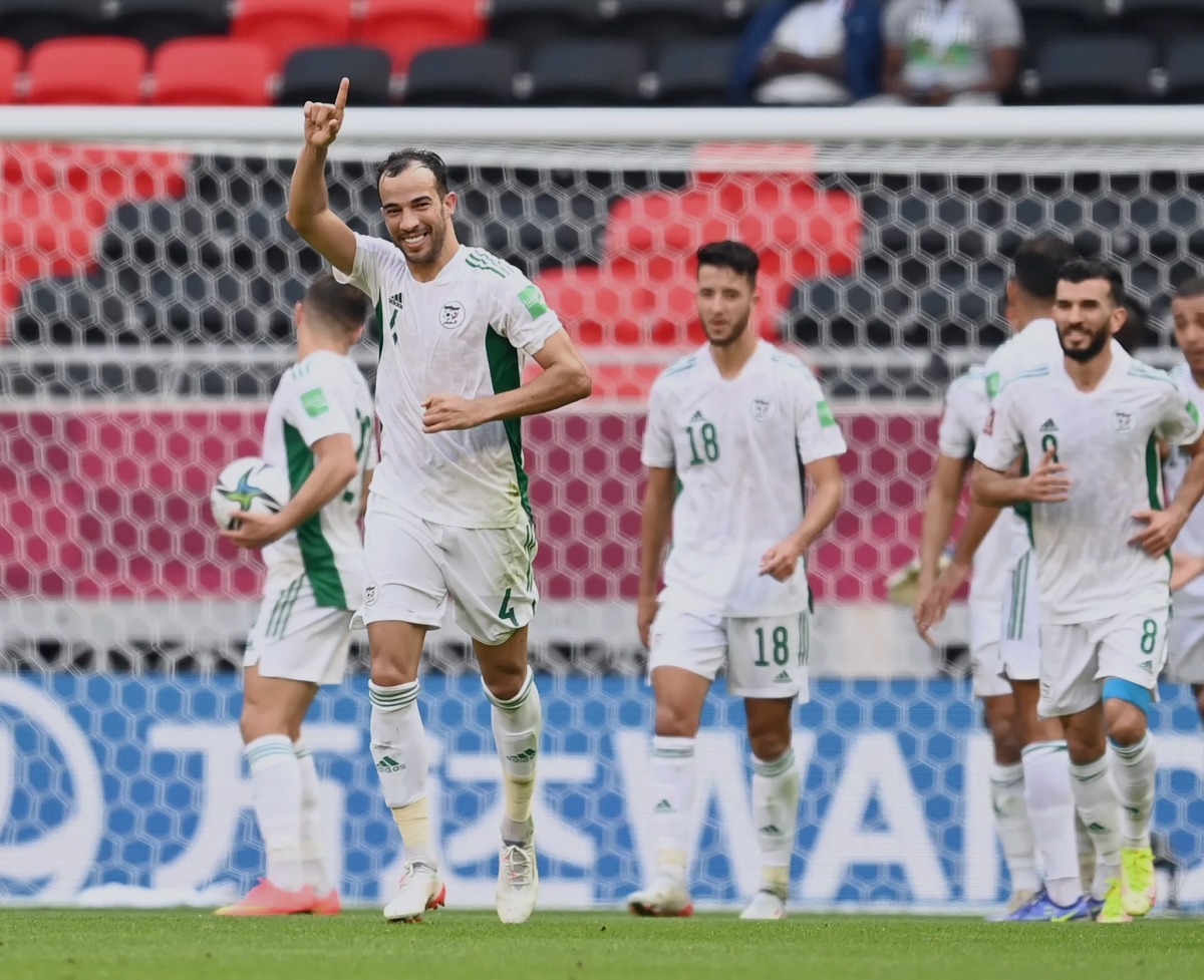 Algeria’s Djamel Benlamri celebrates after scoring against Sudan in their opening match of the FIFA Arab Cup Qatar 2021.