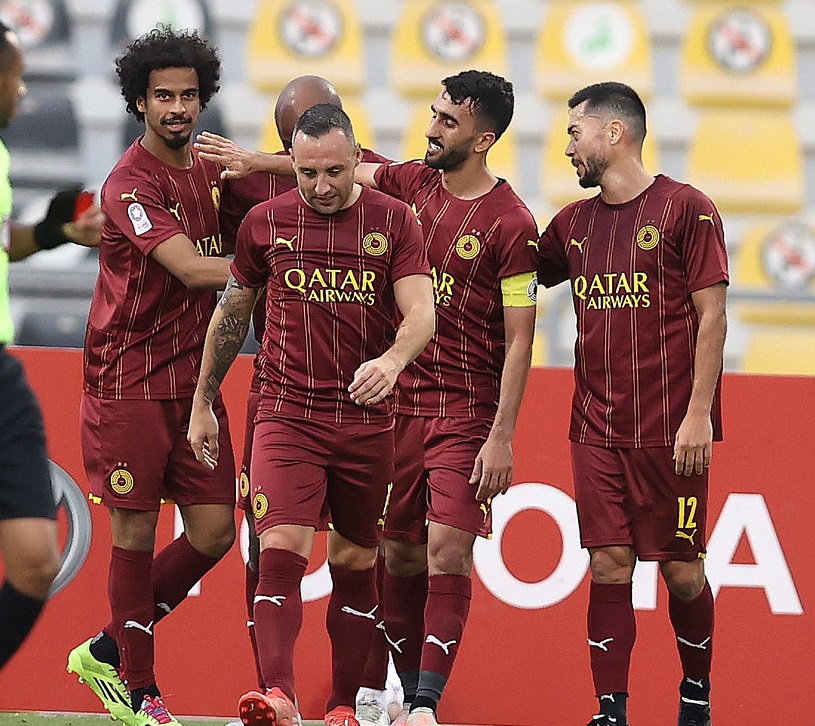 Al Sadd players celebrate during their match against Al Khor.  