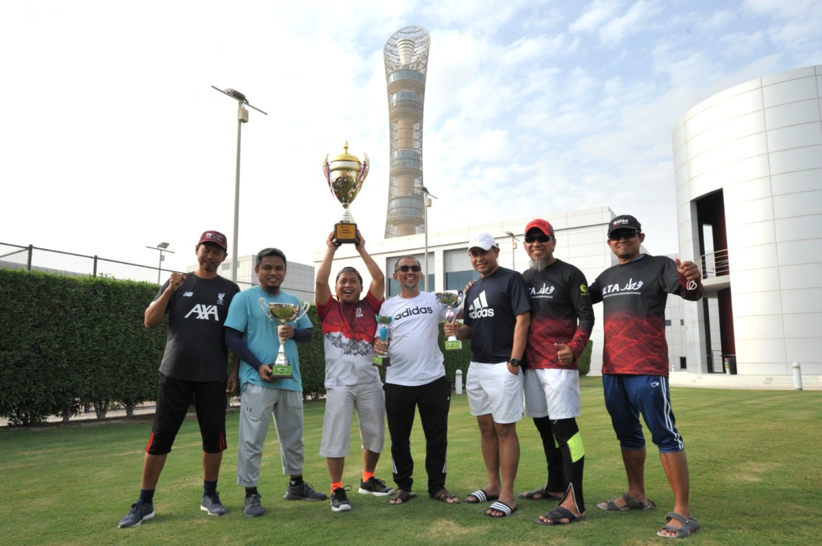 Garuda Team members with Ambassador Cup 2021, which won this year’s tennis tournament.