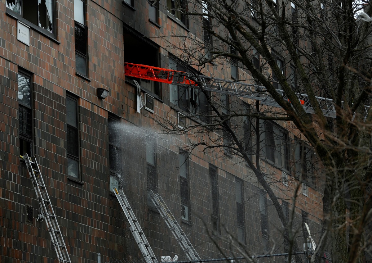 New York City apartment building fire kills 19, injures dozens