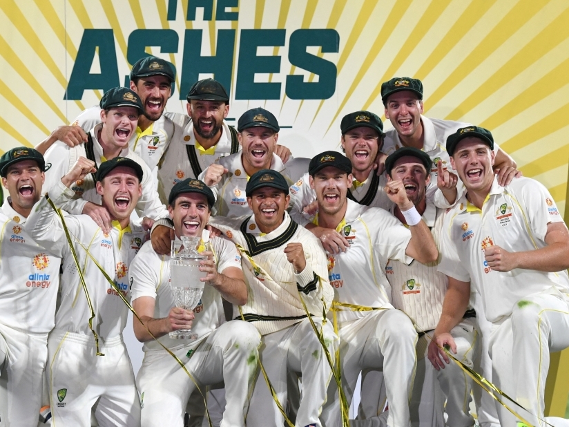 Australia celebrate winning the Ashes series with the trophy Darren England/AAP Image via REUTERS