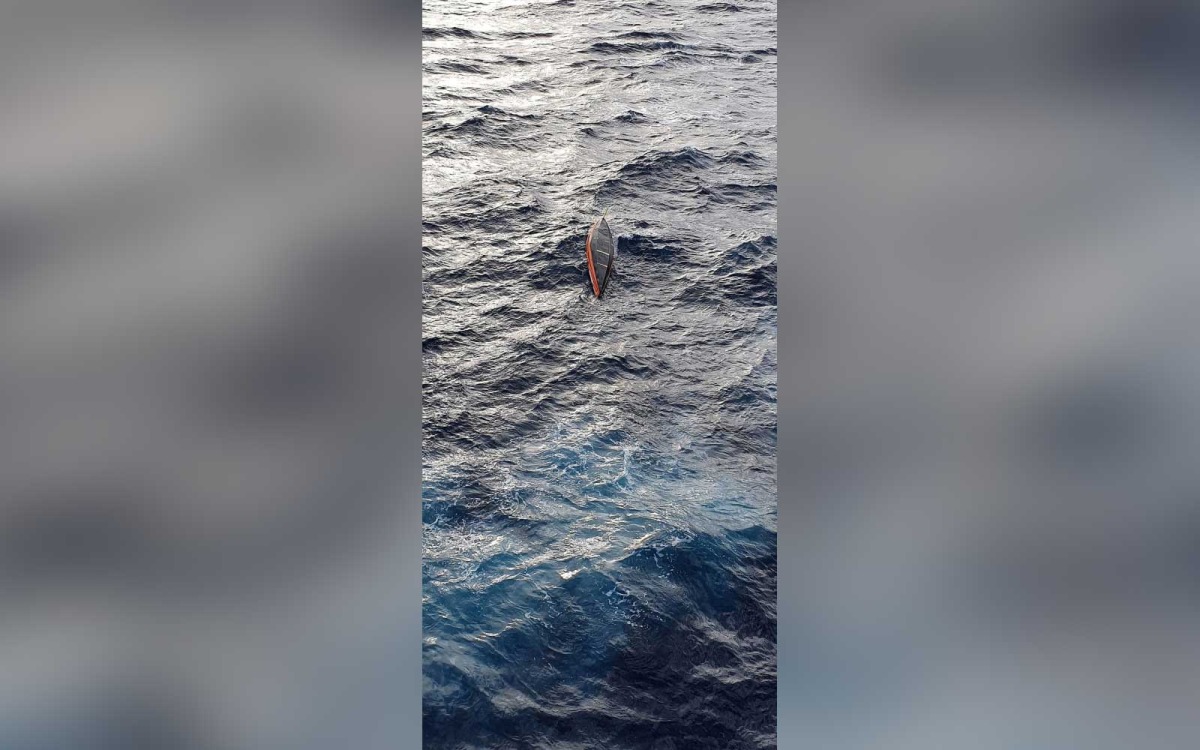 A row boat is seen overturned at sea after Portuguese navy said French adventurer Jean-Jacques Savin, 75, who set off in a row boat from Portugal on January 1, in an attempt to cross the Atlantic solo, has disappeared at sea and the boat was found empty and overturned at sea near the Azores archipelago, January 21, 2022. Portuguese Navy/Handout via REUTERS