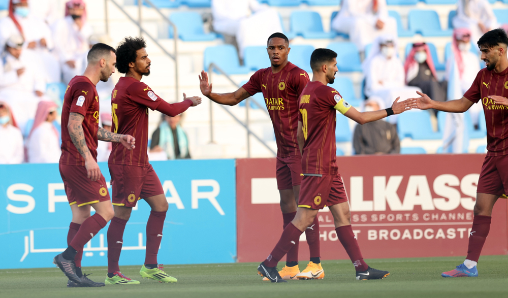 Al Sadd players celebrate after defeating Al Wakrah yesterday.