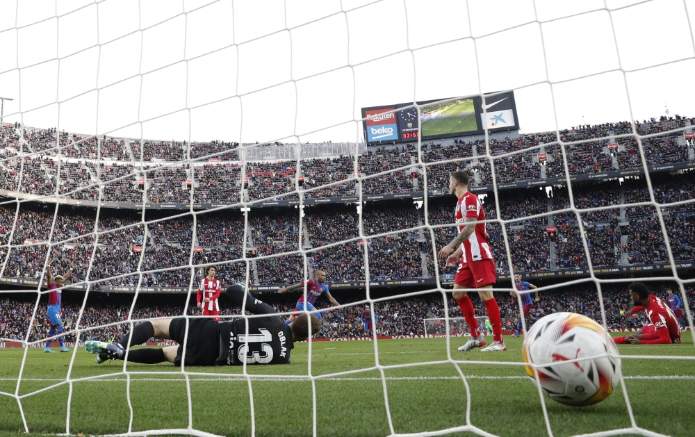 FC Barcelona's Dani Alves scores their fourth goal REUTERS/Albert Gea

