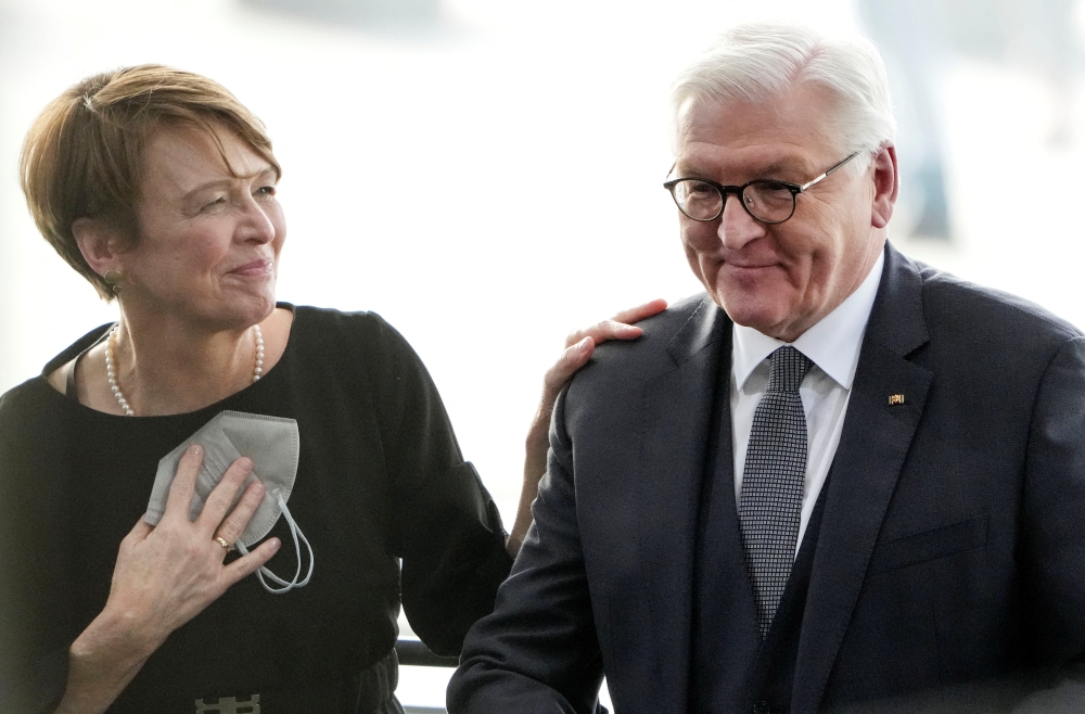 Elke Buedenbender congratulates her husband German President Frank-Walter Steinmeier after he was re-elected as Germany's president by the Federal Assembly at the Bundestag building Paul Loebe Haus, in Berlin, Germany February 13, 2022. Michael Sohn/Pool via REUTERS