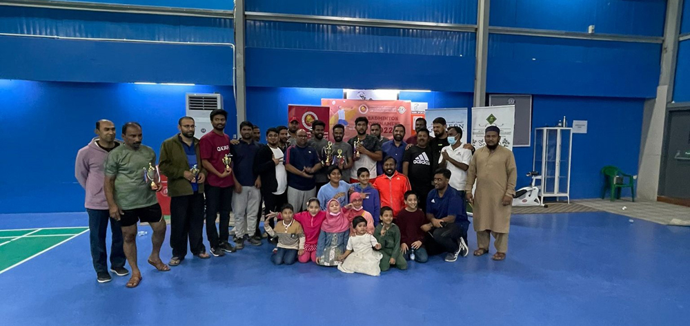 Winners with trophies.
