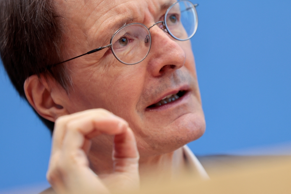 German Health Minister Karl Lauterbach attends a news conference on the current situation regarding the coronavirus disease (COVID-19) pandemic, in Berlin, Germany, February 18, 2022. REUTERS/Hannibal Hanschke