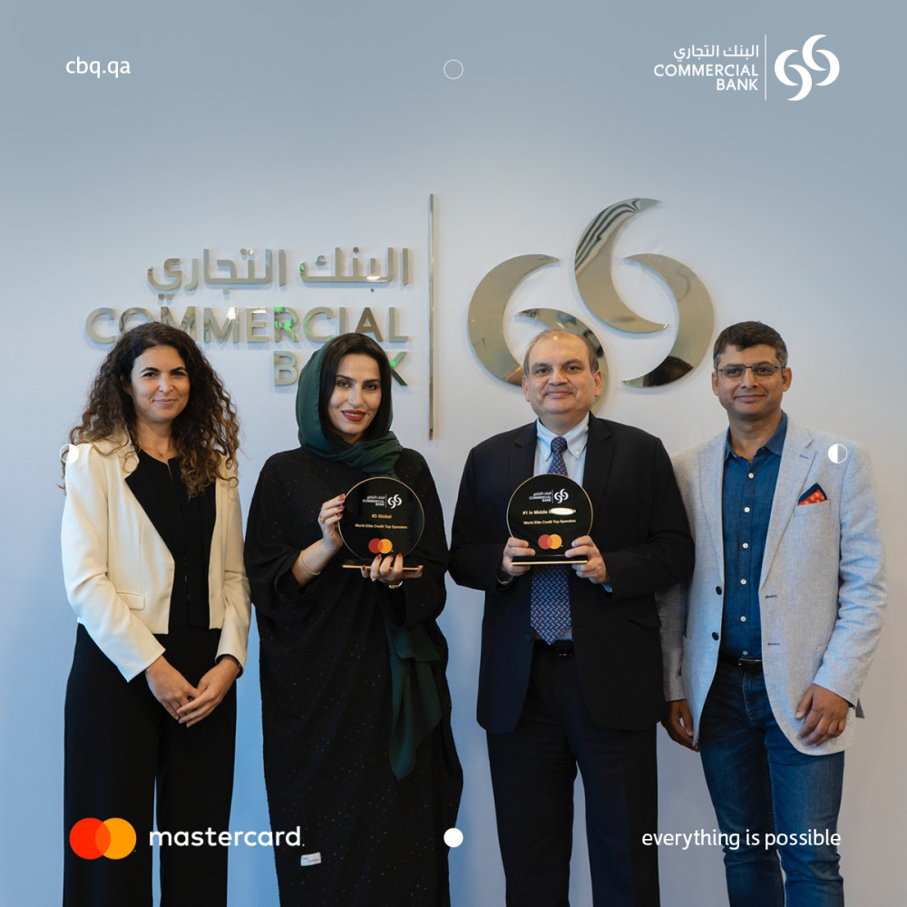 Amit Sah, EGM and Head of Retail Banking, Commercial Bank and Roya Khajeh, AGM and Head of Cards and Payments, Commercial Bank and other officials during the award ceremony.