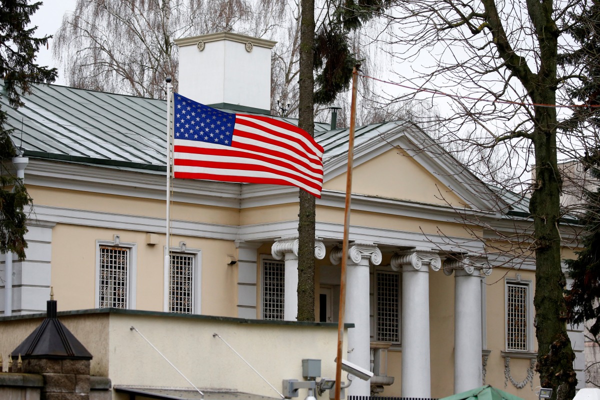 FILE PHOTO: A flag flies at the embassy of the United States in Minsk, Belarus January 24, 2020. Picture taken January 24, 2020. REUTERS/Vasily Fedosenko/File Photo

