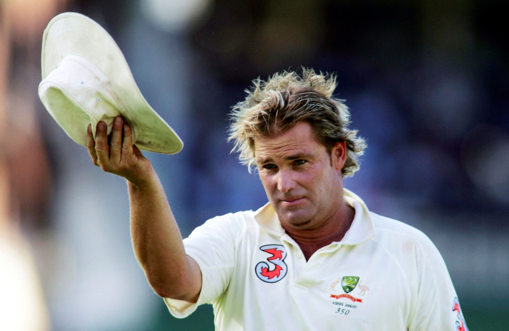Australia's Shane Warne acknowledges the crowd after the wicket of England's Andrew Flintoff Mandatory Credit: Action Images / Jason O'Brien/File Photo