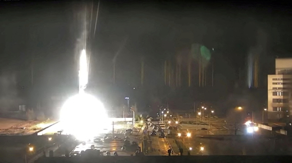 FILE PHOTO: Surveillance camera footage shows a flare landing at the Zaporizhzhia nuclear power plant during shelling in Enerhodar, Zaporizhia Oblast, Ukraine March 4, 2022, in this screengrab from a video obtained from social media. 