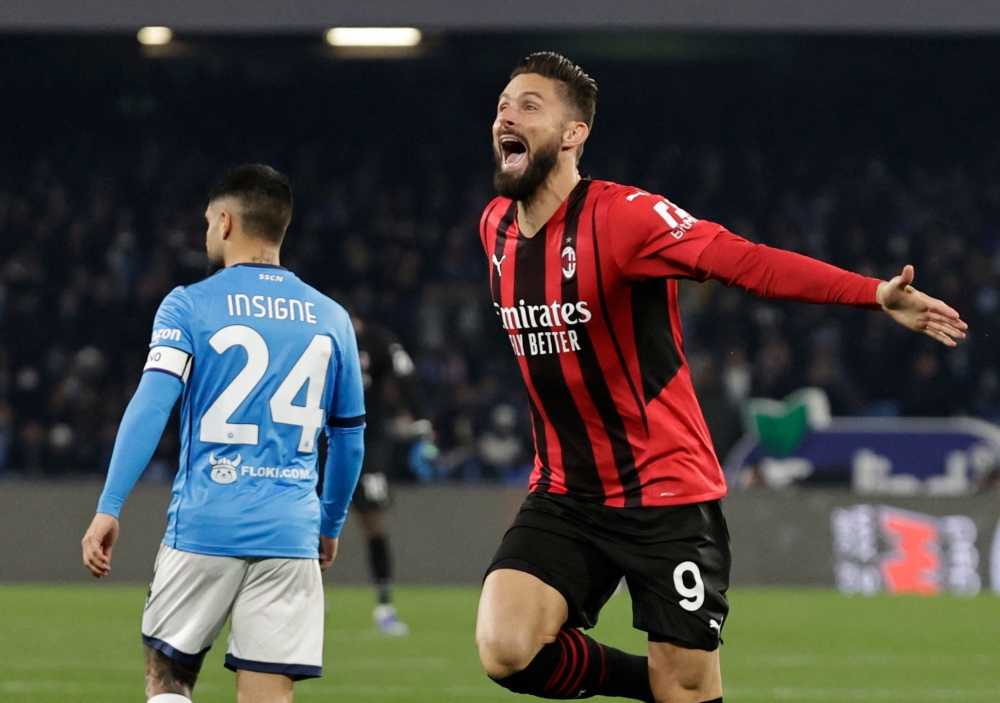 AC Milan's Olivier Giroud celebrates scoring their first goal REUTERS/Ciro De Luca
