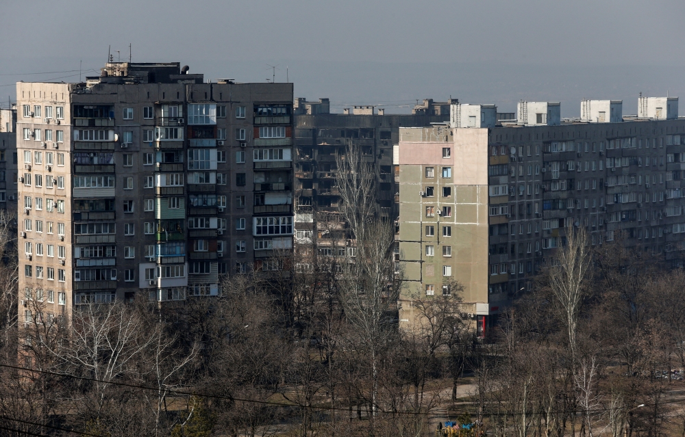 Residential buildings damaged in fighting during Ukraine-Russia conflict are seen in the besieged southern port of Mariupol, Ukraine March 23, 2022. REUTERS/Alexander Ermochenko