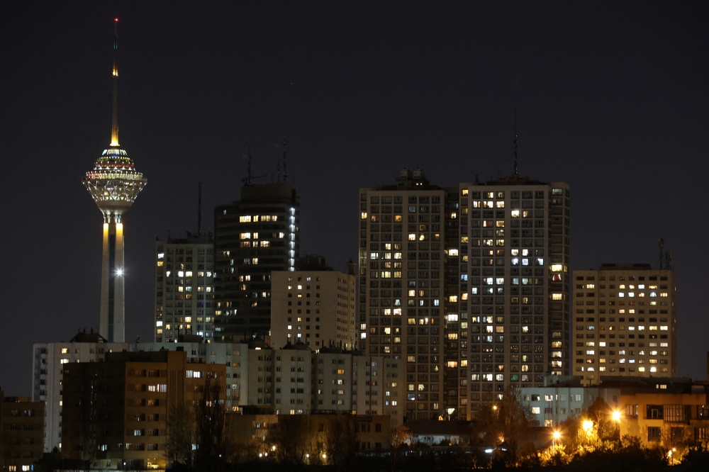 Milad Tower is pictured after the lights were turned back on after Earth Hour in Tehran, Iran, March 26, 2022. Majid Asgaripour