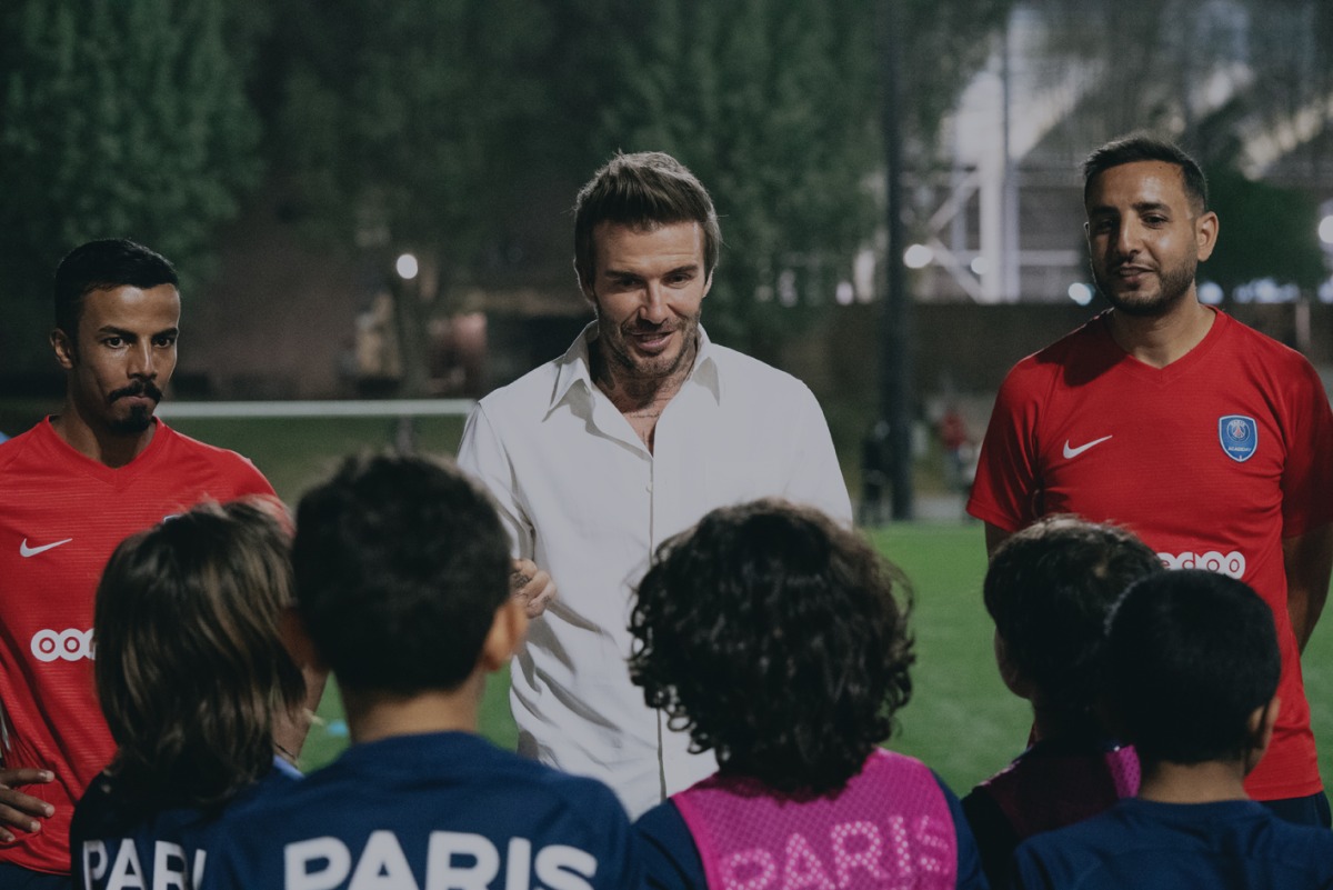 English football legend David Beckham with Paris Saint-Germain Academy players in Doha.