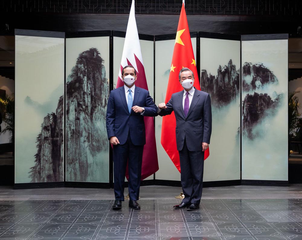 Deputy Prime Minister and Minister of Foreign Affairs H E Sheikh Mohammed bin Abdulrahman Al Thani and State Councillor and Minister of Foreign Affairs of China H E Wang Yi during their meeting.