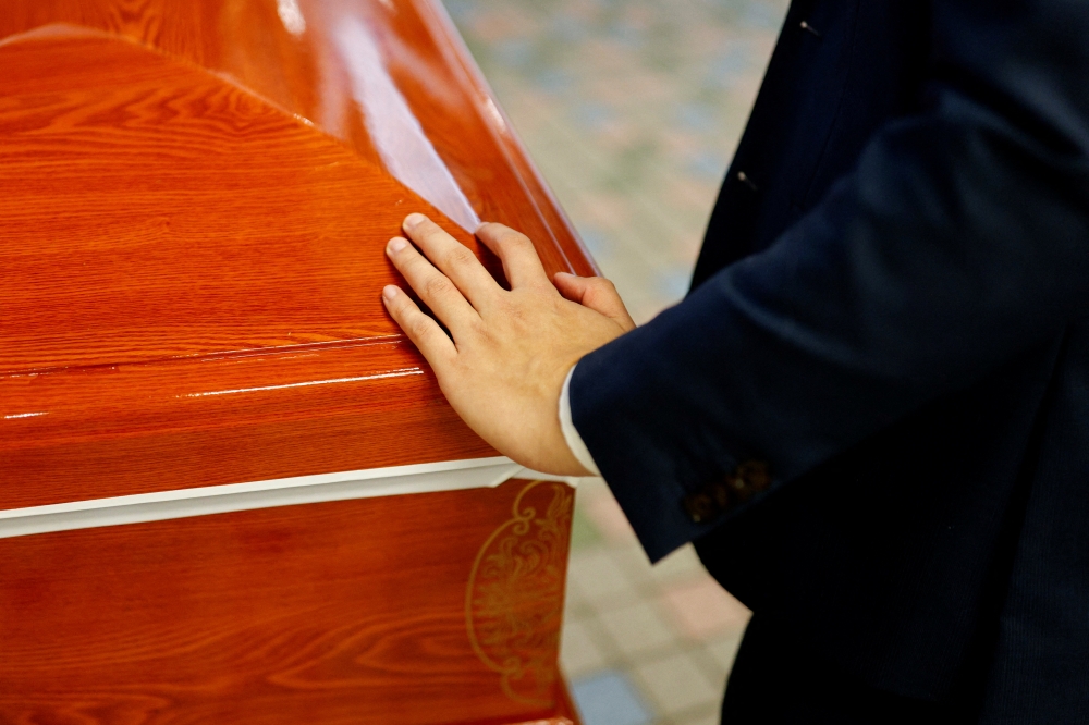 'So many bodies piled up': Hong Kong funeral services overwhelmed by Covid - Vimarsana News