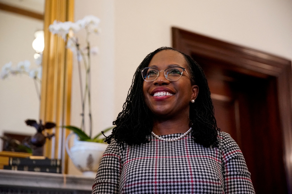 U.S. Supreme Court nominee Judge Ketanji Brown Jackson reacts as she meets with U.S. Senator Bill Hagerty (R-TN) on Capitol Hill in Washington, U.S., March 29, 2022. REUTERS/Elizabeth Frantz/