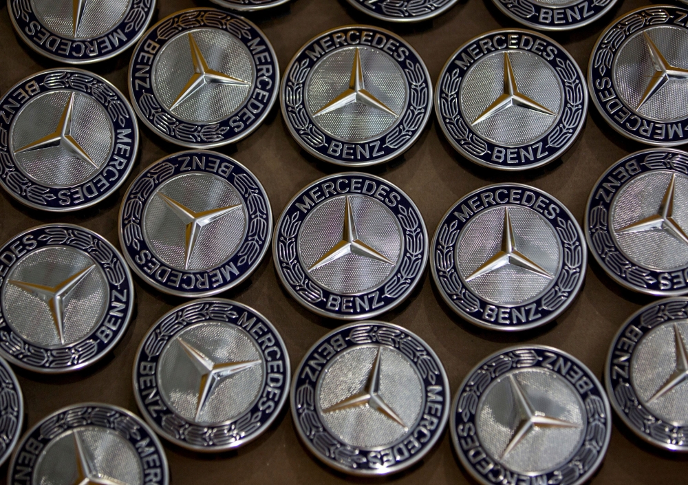 Mercedes-Benz logos are seen at the company's vehicle assembly plant in Chakan, outside Pune, India, June 11, 2015. REUTERS/Danish Siddiqui/File Photo