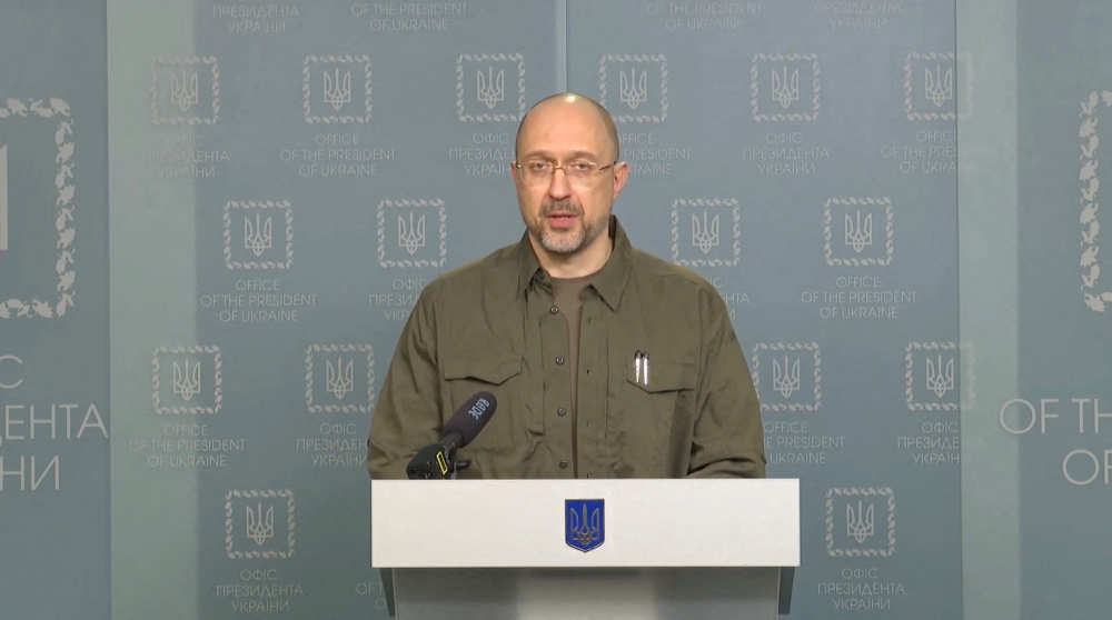 Ukrainian Prime Minister Denys Shmyhal speaks on the Chernobyl exclusion zone at a news briefing in Kyiv, Ukraine February 24, 2022, in this screen grab taken from a video. Ukrainian Governmental Press Service/Handout via REUTERS/File Photo